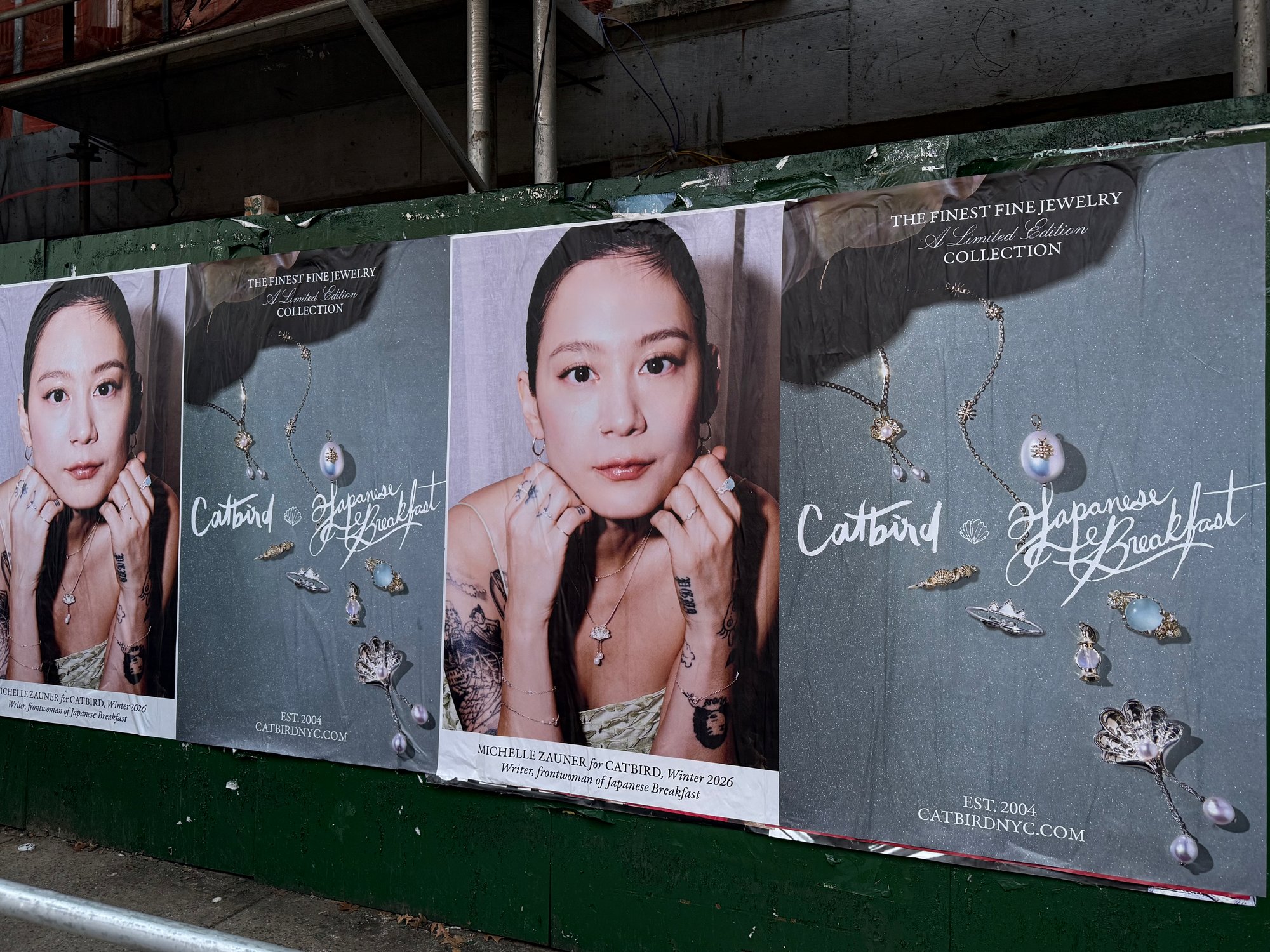 Catbird x Japanese Breakfast wild posting at scale, 18 Havermeyer Street construction scaffolding
