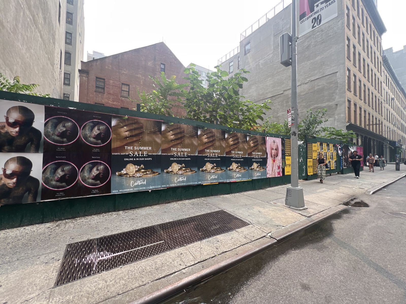 Catbird Summer Sale wild posting installation on 119 W 23rd Street in Chelsea, Manhattan