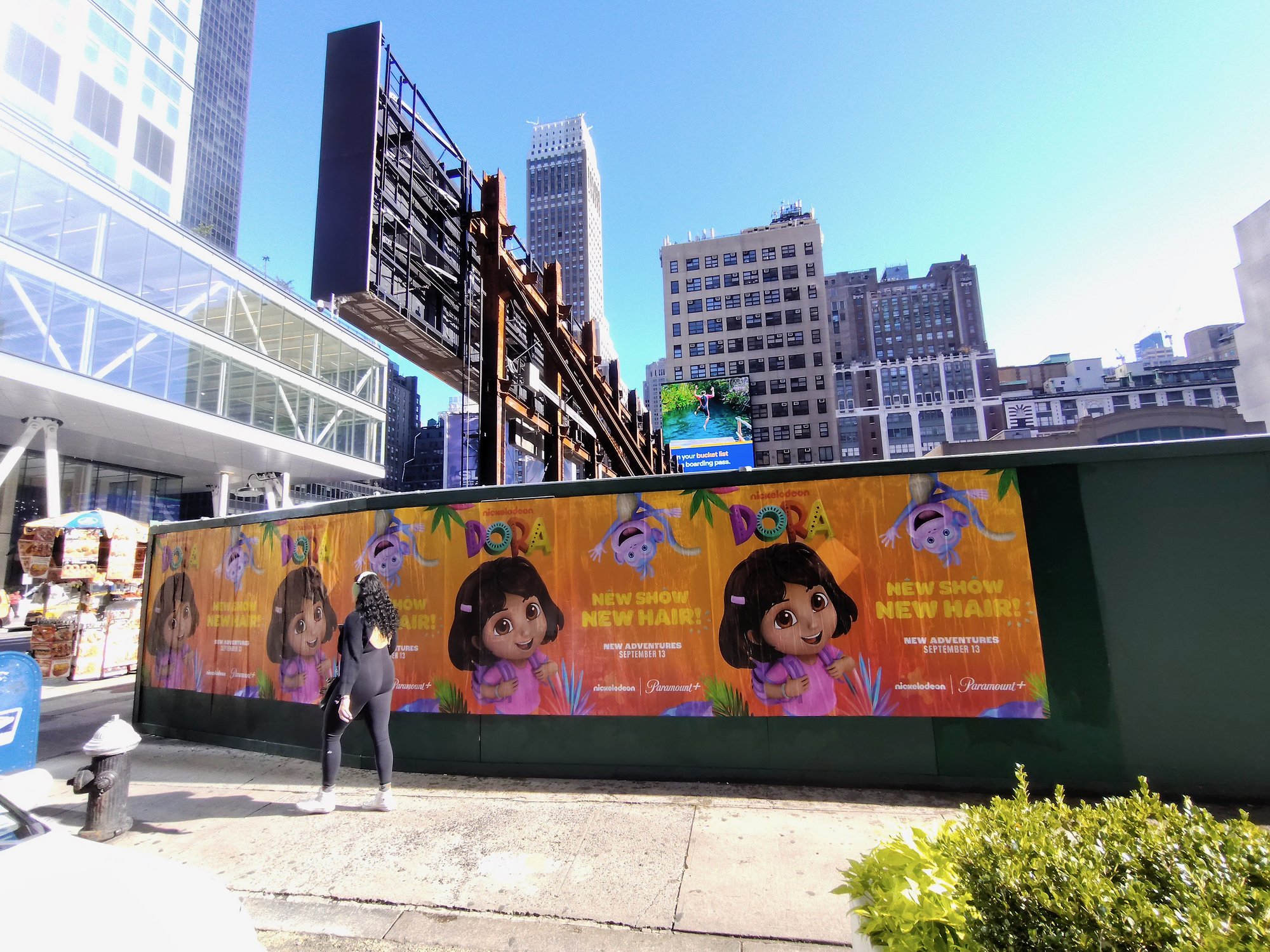 Nickelodeon Dora wild posting at 401 7th Avenue, Midtown Manhattan