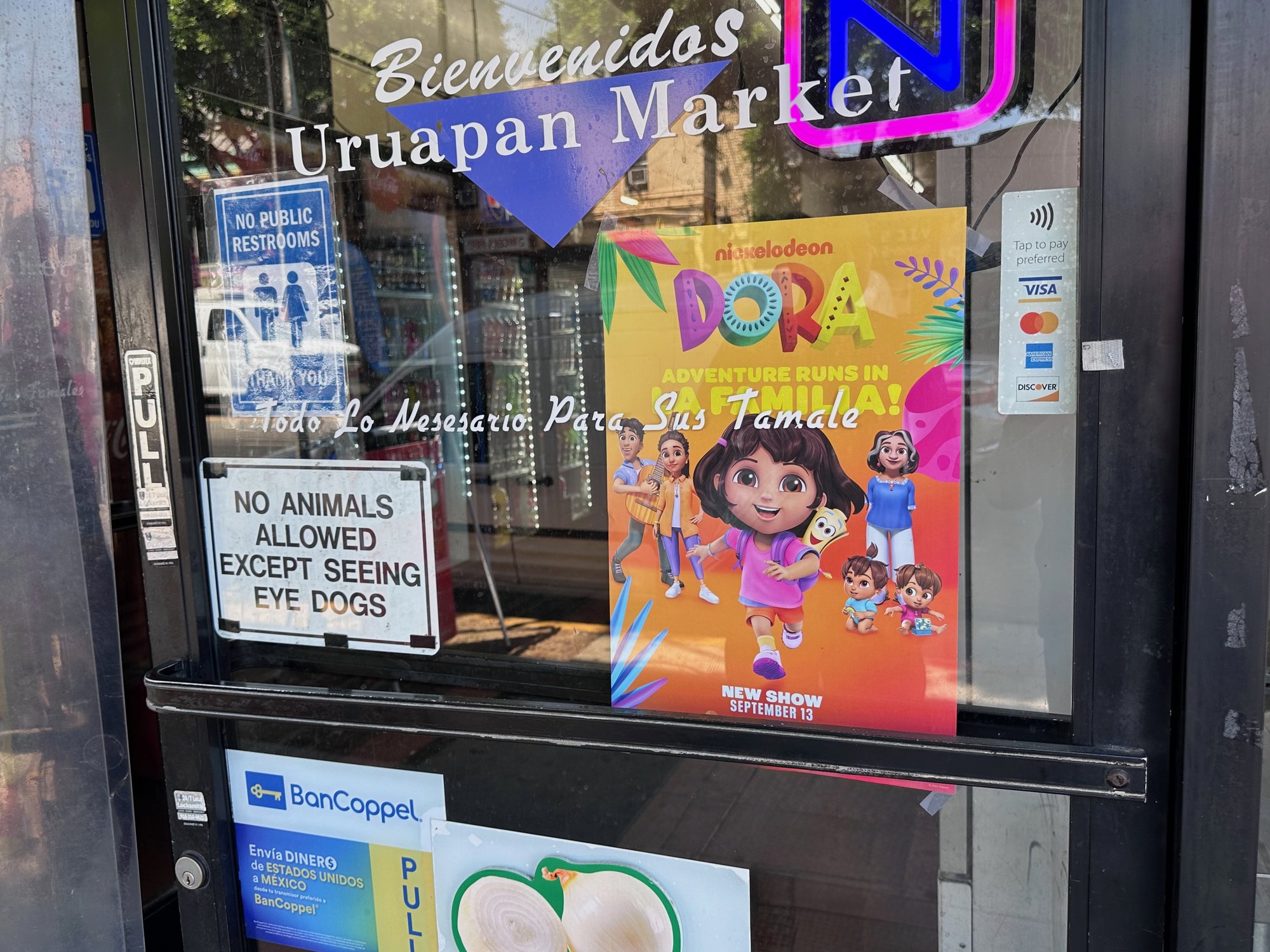 Nickelodeon Dora Adventure Runs in La Familia retail poster at Uruapan Market, East Los Angeles
