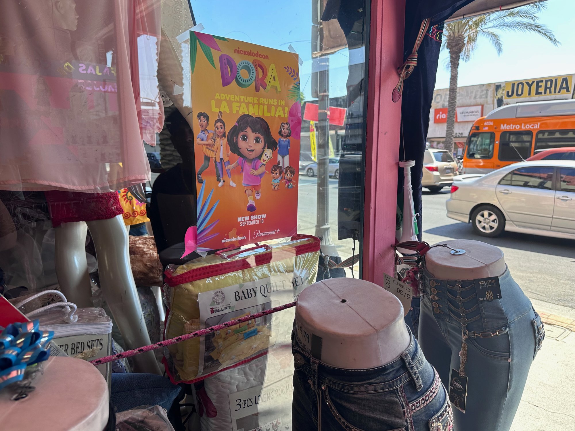 Nickelodeon Dora retail poster at Whittier Boulevard boutique storefront, East Los Angeles