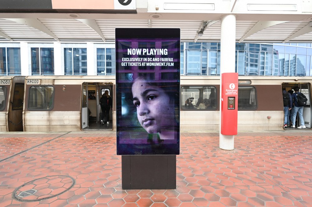 Monument digital OOH placement on DC Metro rail platform