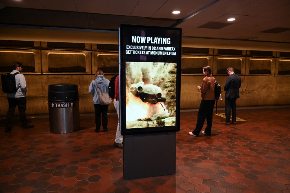 Monument car explosion creative on platform at L'Enfant Plaza station