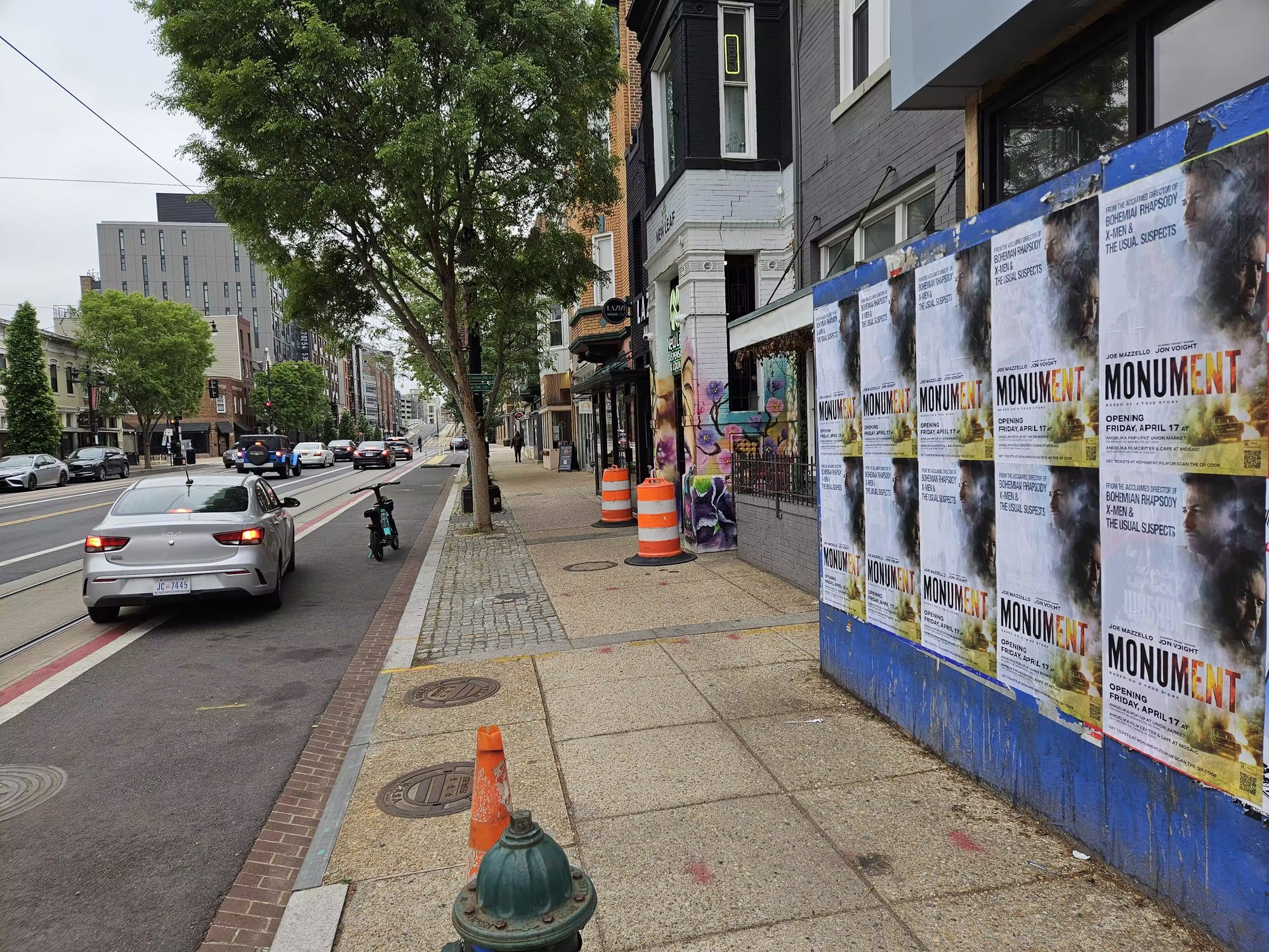 Monument wild posting on the H Street commercial corridor, Washington DC