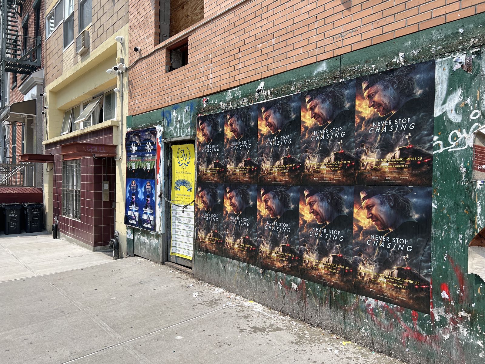 Never Stop Chasing wild posting at 205 Henry St, Manhattan