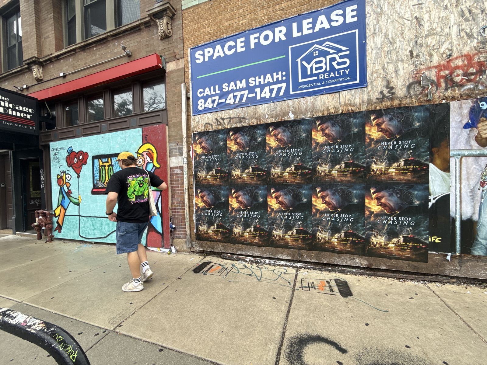Never Stop Chasing wild posting at 2332 N Milwaukee Ave, Chicago