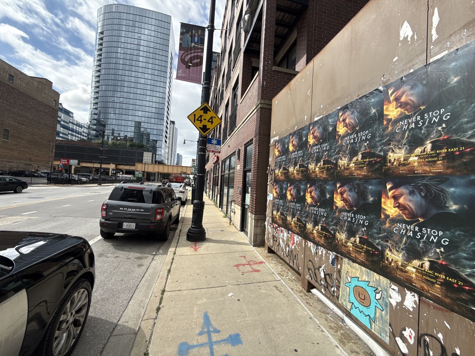 Never Stop Chasing wild posting at 220 N Halsted St, Chicago